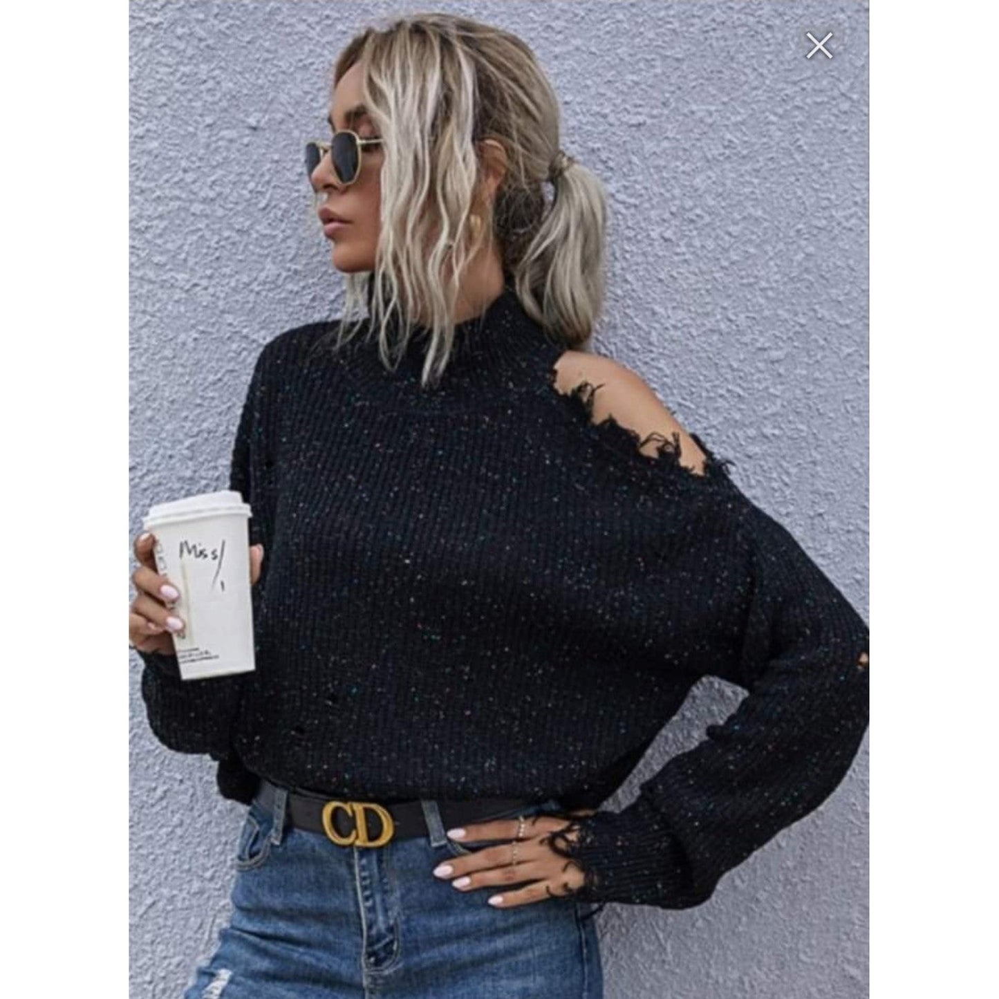Distressed, black sweater