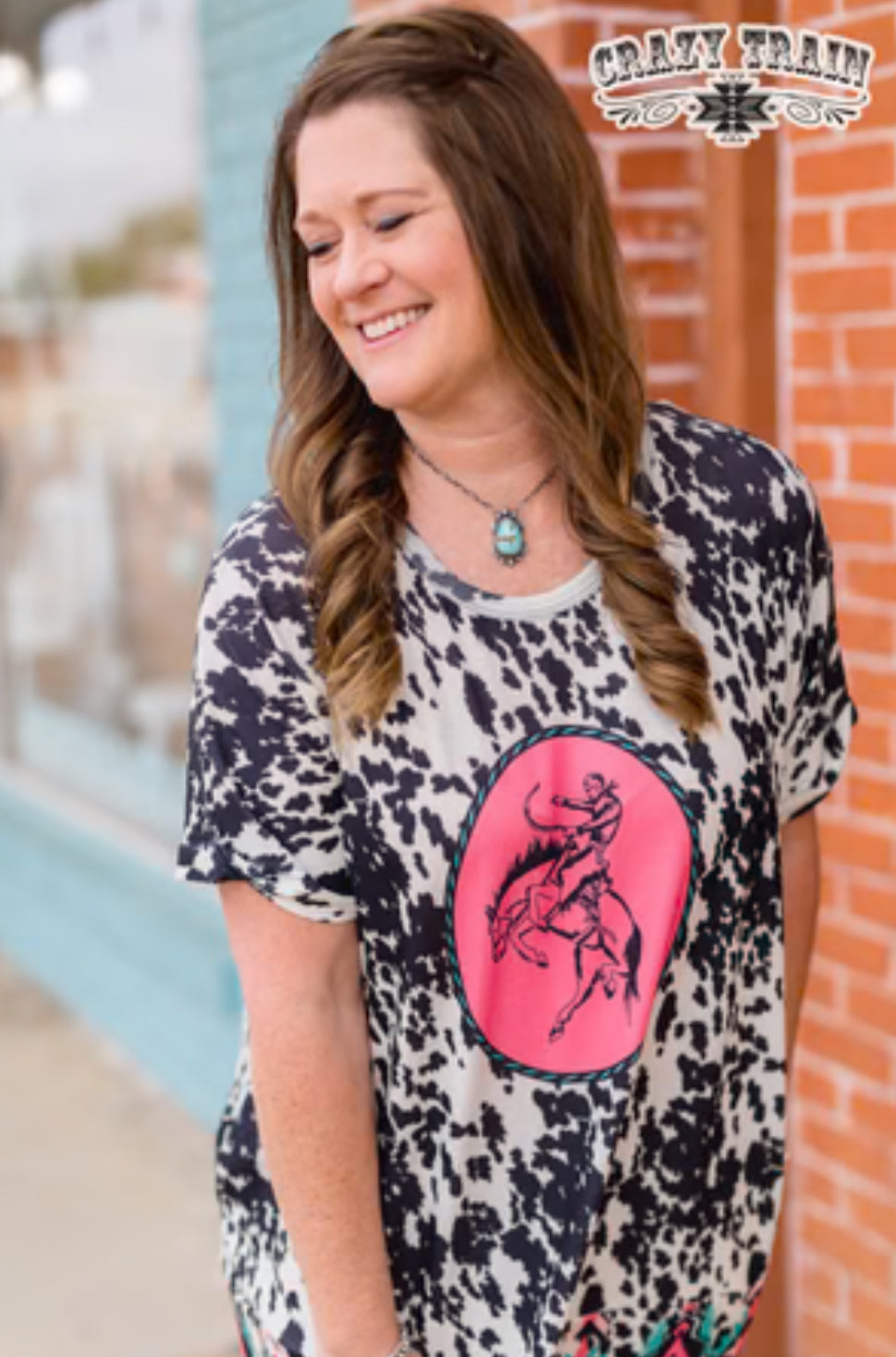 COW PRINT WTH COWBOY DRESS